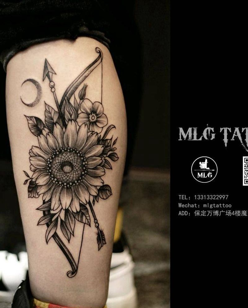 弓箭与花朵纹身图片