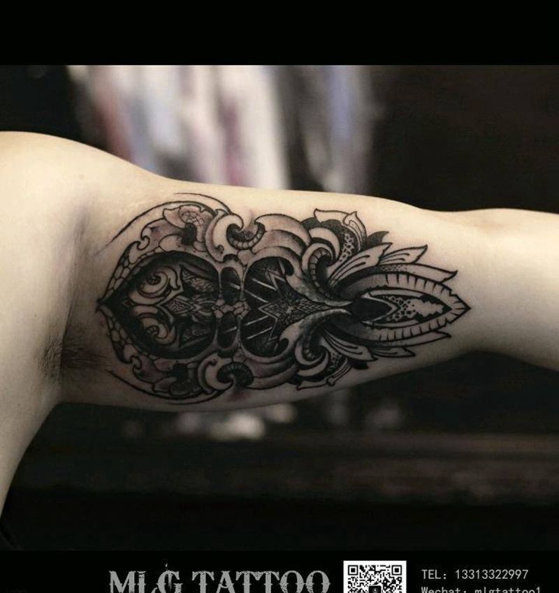 曼达拉纹身图片_手臂点刺纹身图案