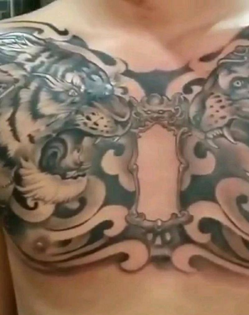 双虎纹身图片_胸部欧美写实纹身图案