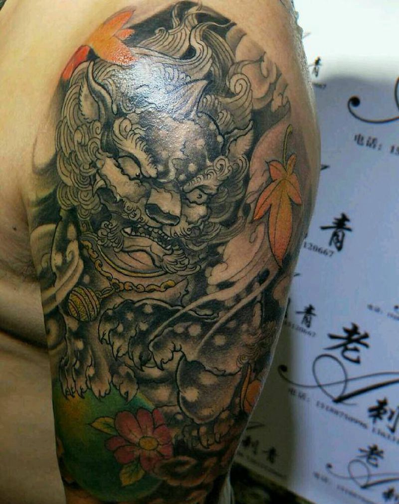 大臂唐狮遮盖老纹身纹身图片