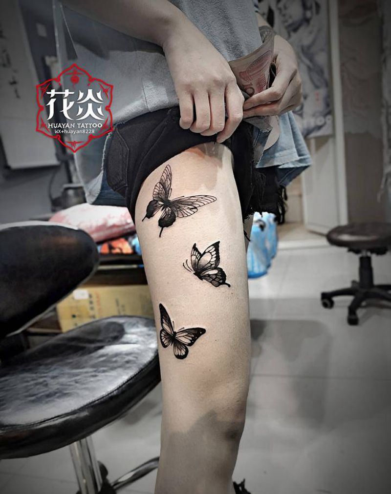 三只蝴蝶纹身图片_腿部点刺蝴蝶纹身图案
