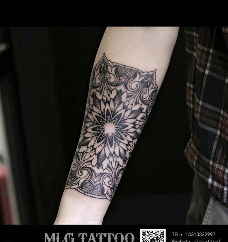 曼达拉纹身图片_手臂点刺图腾纹身图案