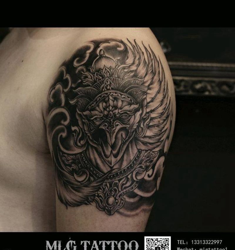 传统雕纹身图片_手臂老传统纹身图案