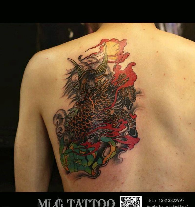 传统彩色麒麟纹身图片_手臂老传统纹身图案