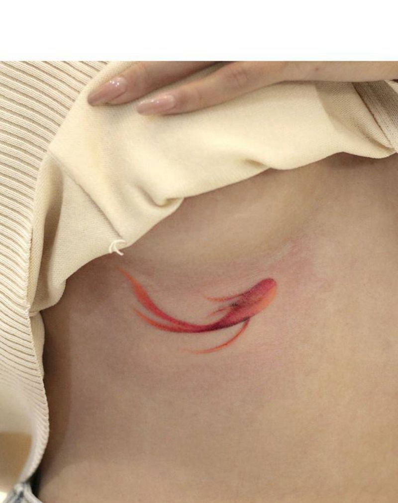 金鱼纹身图片_胸部水彩纹身图案