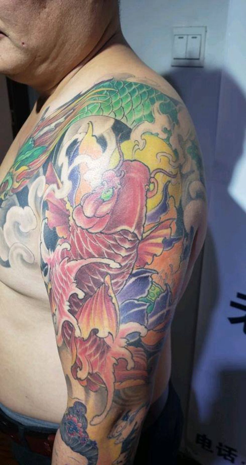 老龙头修改加鱼纹身图片_手臂胸部老传统鱼纹身图案