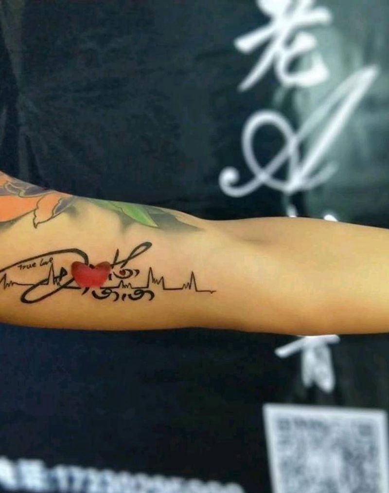 字母纹身图片_手臂花体字纹身图案