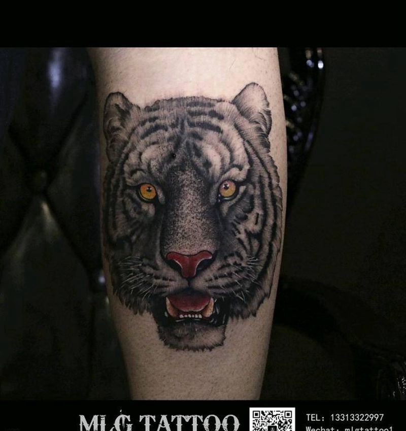 老虎纹身图片_腿部欧美写实纹身图案