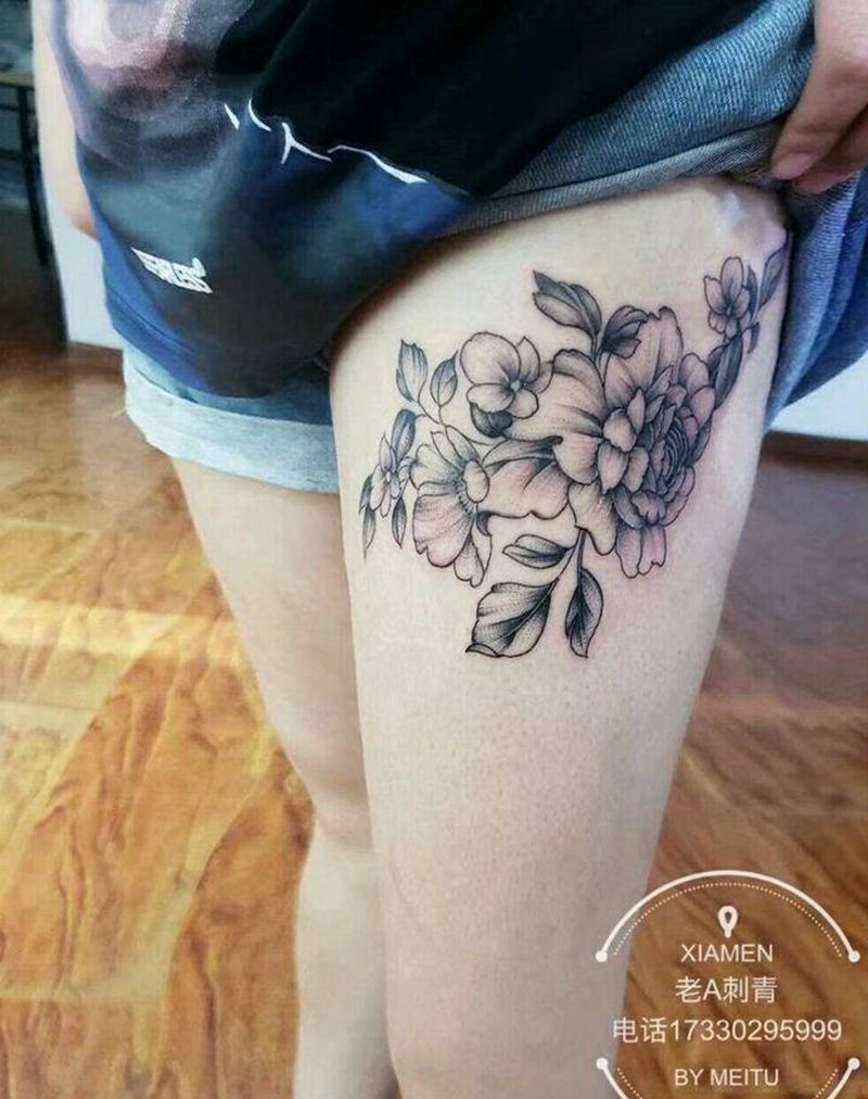 花卉纹身图片_腿部点刺素花纹身图案