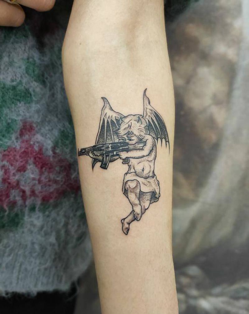 小恶魔纹身图片_手臂点刺纹身图案