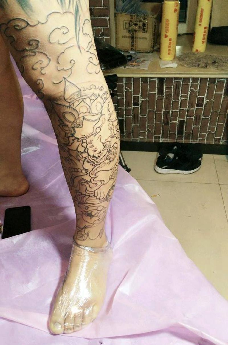 小腿象神纹身图片_腿部新传统纹身图案