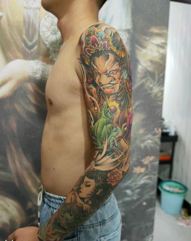 黄财神纹身图片_手臂纹身图案