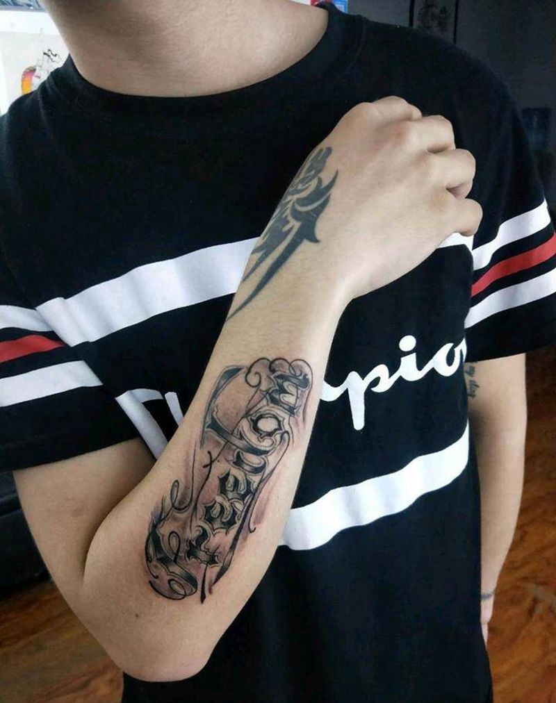 奇卡诺花体纹身图片_手臂花体字纹身图案