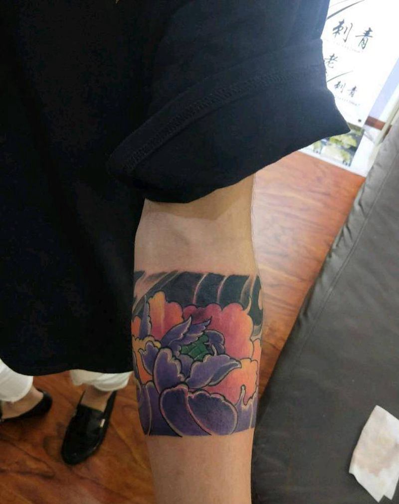 臂环遮盖纹身图片_手臂纹身图案