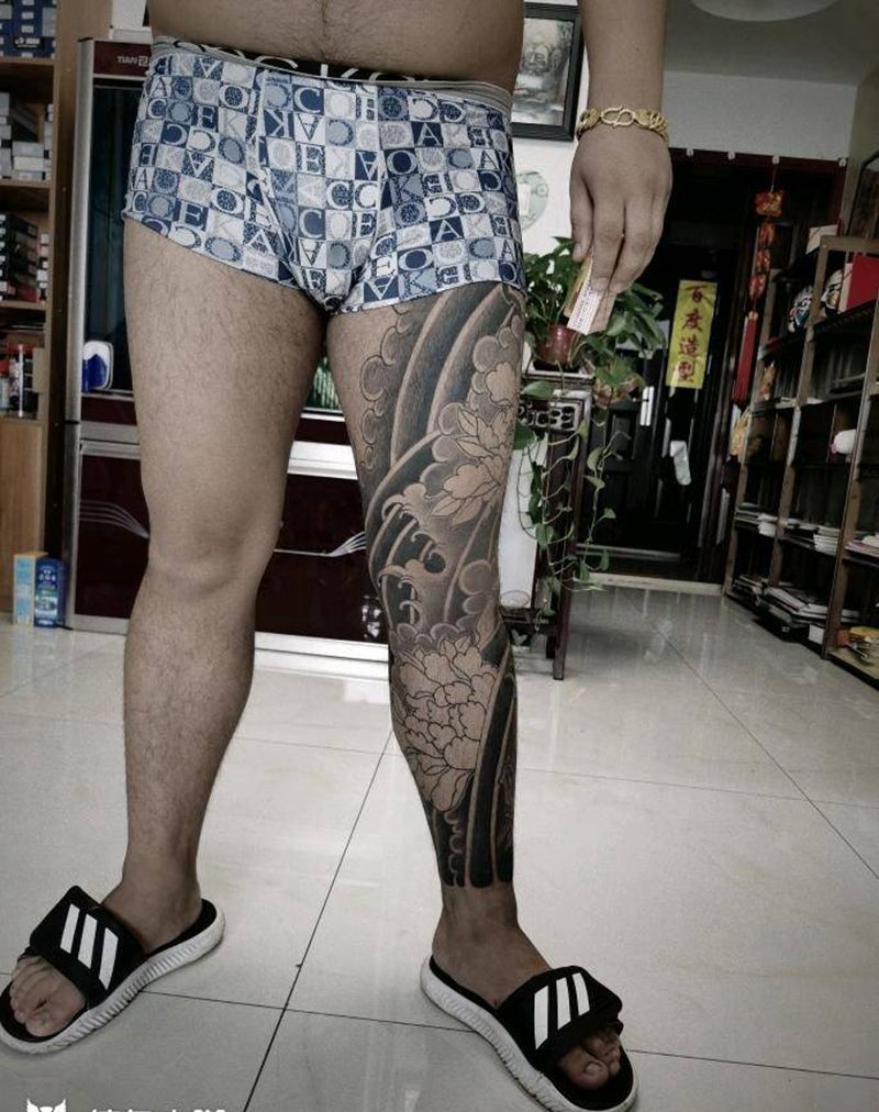 花腿待续纹身图片_腿部老传统纹身图案