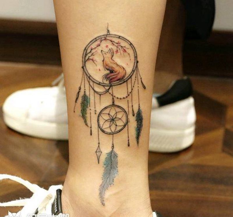 捕梦网纹身图片_腿部水墨水彩纹身图案