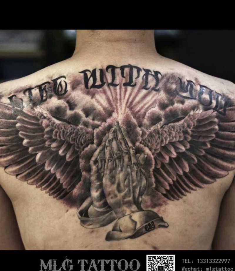 后背遮盖痘印纹身图片