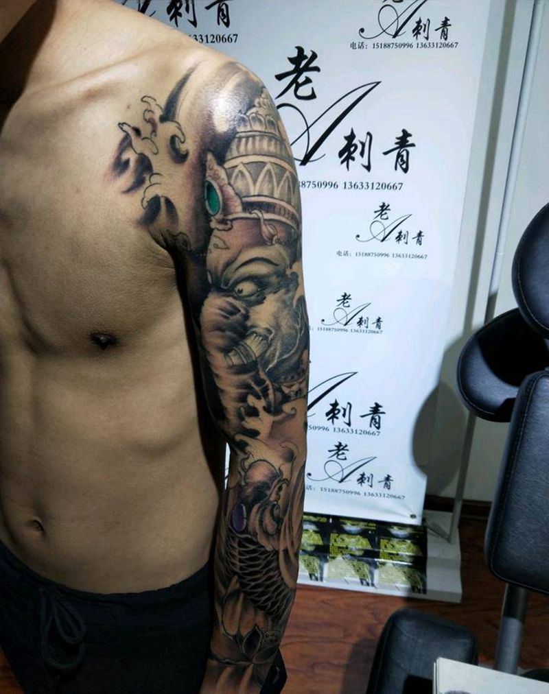 象神鲫鱼花臂纹身图片_手臂传统动物鬼神成品纹身图案