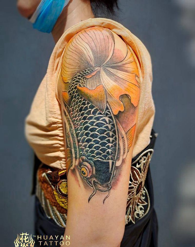 鱼遮盖纹身图片_肩部新传统鱼纹身图案