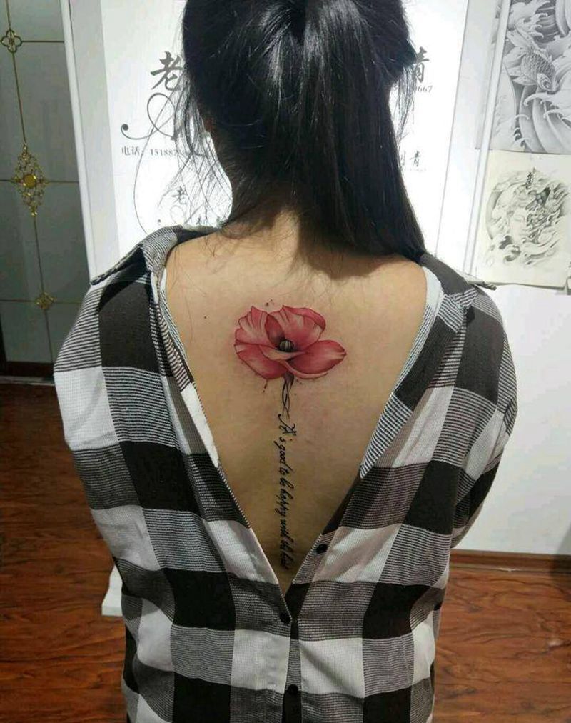 美女后背花纹身图片