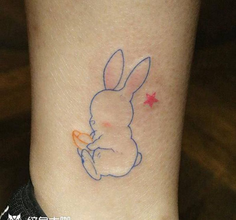清新小兔子纹身图片_腿部图腾纹身图案