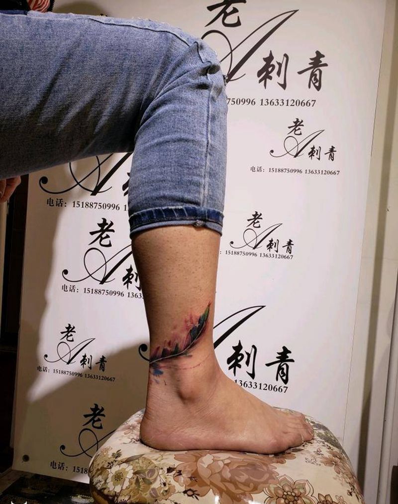 羽毛纹身图片_腿部新传统纹身图案
