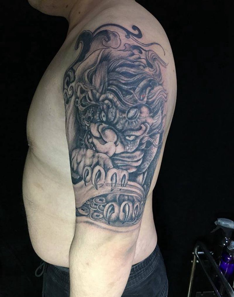 貔貅遮盖龙头纹身图片_手臂手部新传统纹身图案