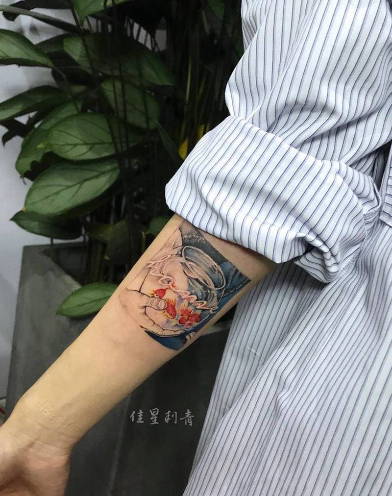 金鱼纹身图片_手臂纹身图案