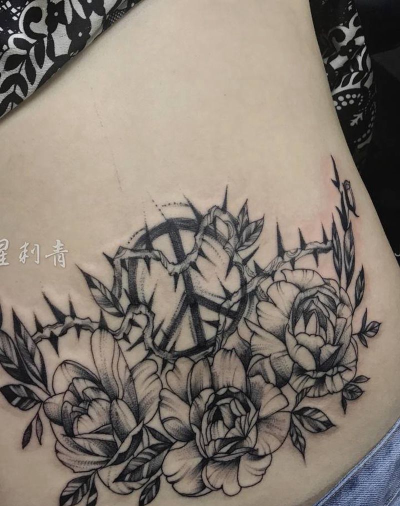 黑灰花纹身图片_腰部花纹身图案