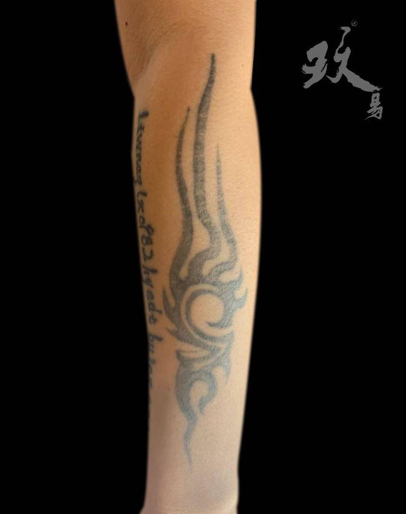 浪花遮盖纹身图片_手臂水墨纹身图案