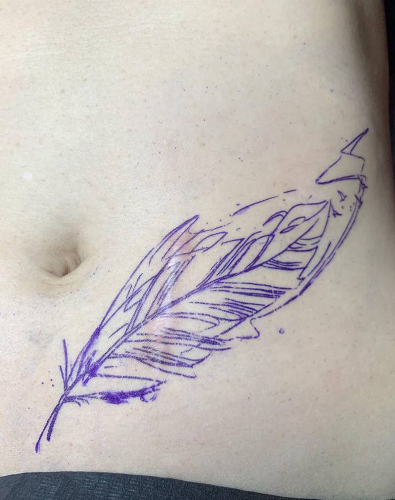 伤疤遮盖纹身图片_腹部水彩纹身图案