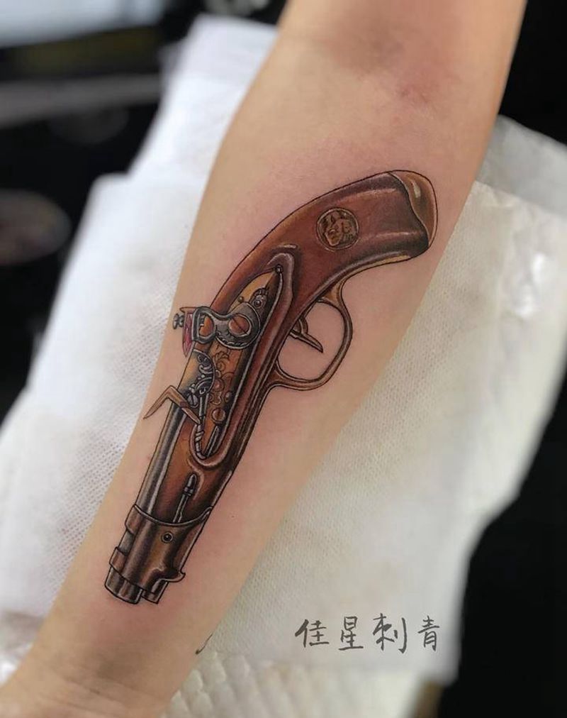 火枪纹身图片_手臂枪纹身图案