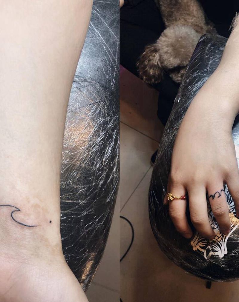 浪花纹身图片_手部手臂纹身图案