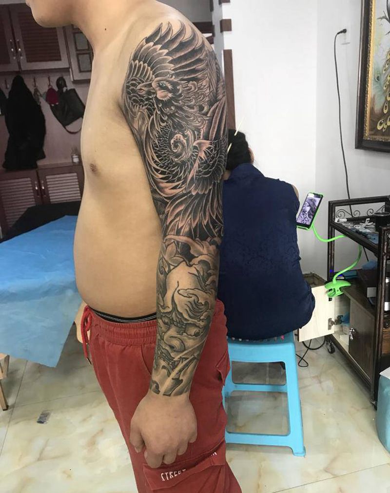 凤凰 般若花臂纹身图片_手臂新传统纹身图案