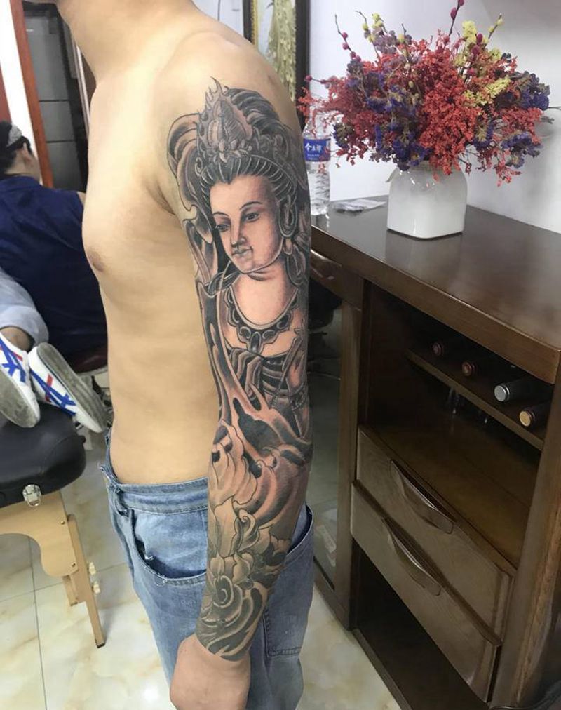 观音 荷花花臂纹身图片_手臂新传统纹身图案