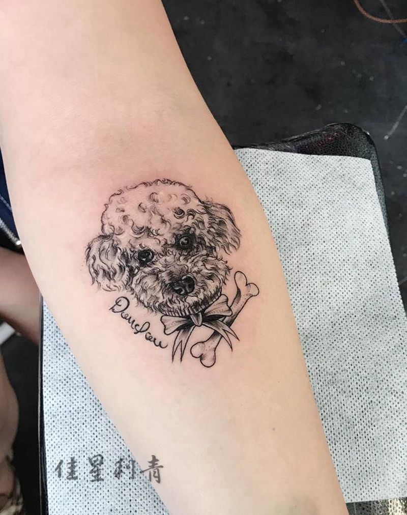 小泰迪纹身图片_手臂点刺狗纹身图案