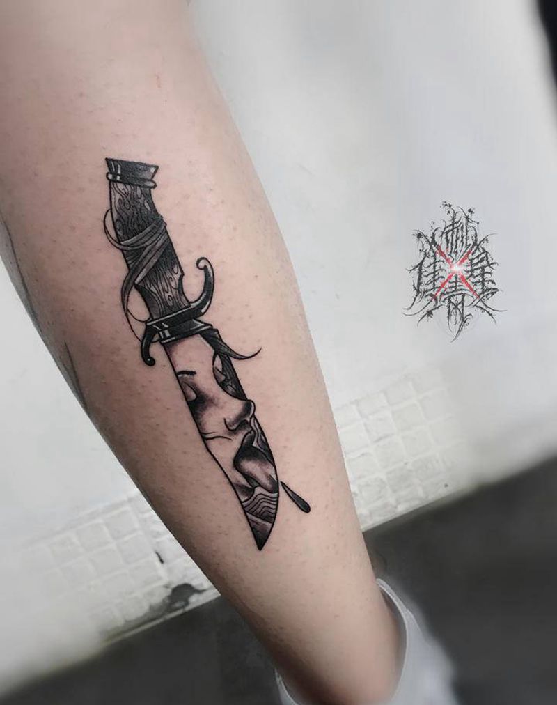 刀纹身图片_腿部欧美写实纹身图案