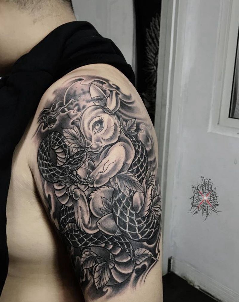 蛇盘兔纹身图片_手臂纹身图案