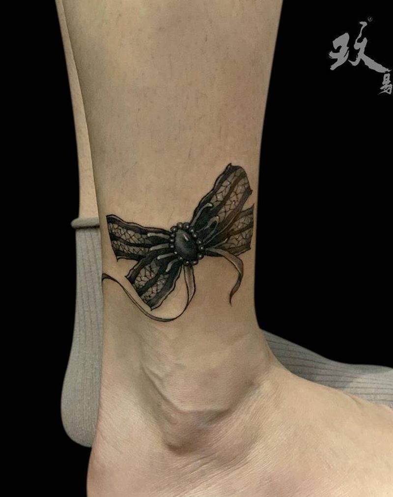 蕾丝蝴蝶结纹身图片_腿部纹身图案