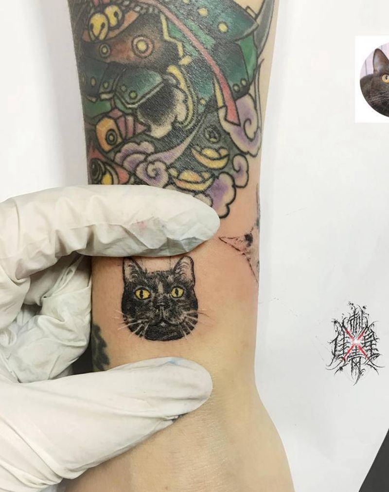 客人家的小猫咪纹身图片_手臂纹身图案