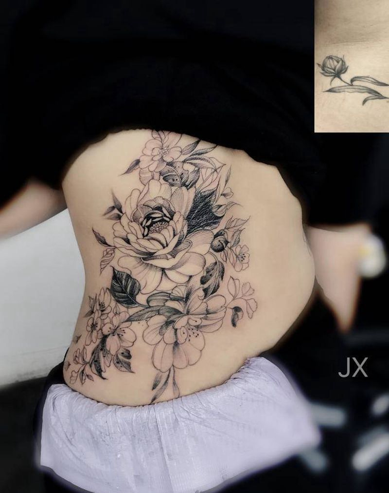 素花遮盖纹身图片_腰部纹身图案
