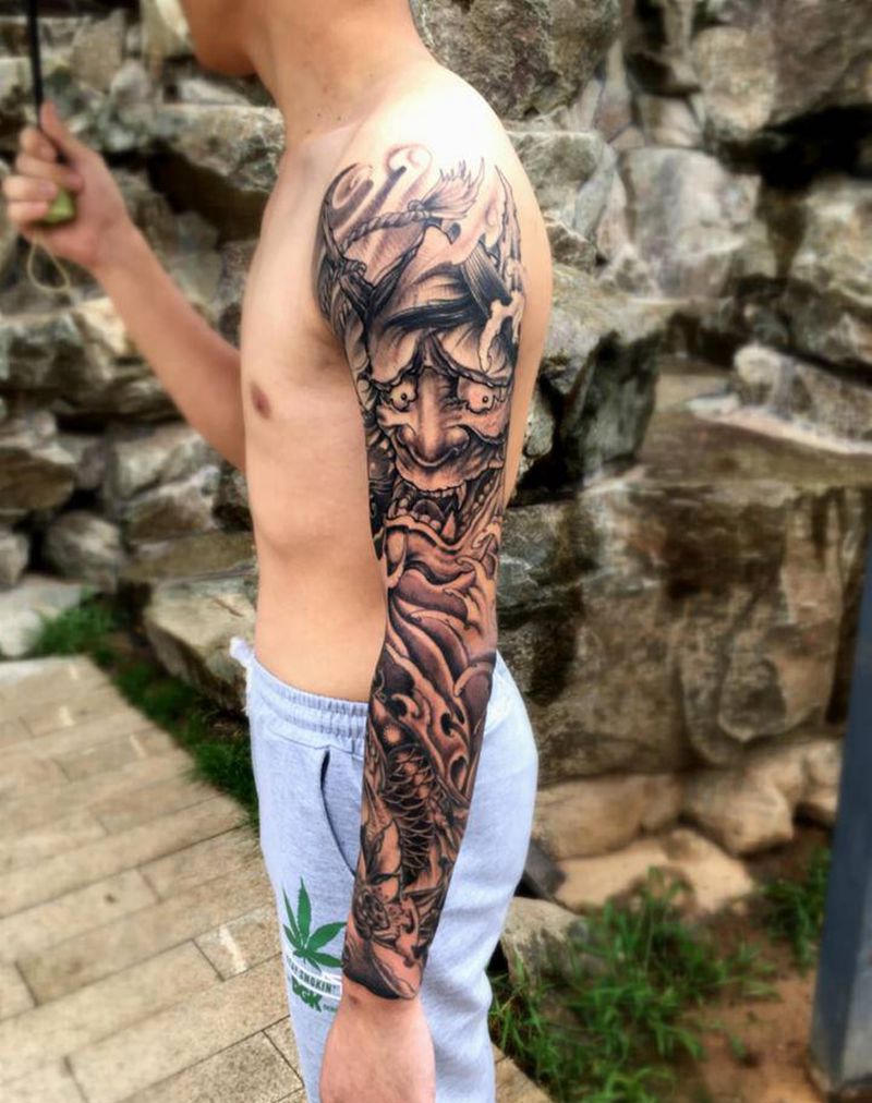 般若锦鲤花臂纹身图片_手臂纹身图案