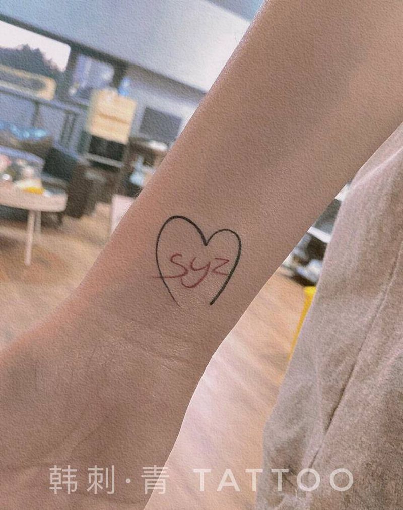爱心一枚～纹身图片_手臂纹身图案