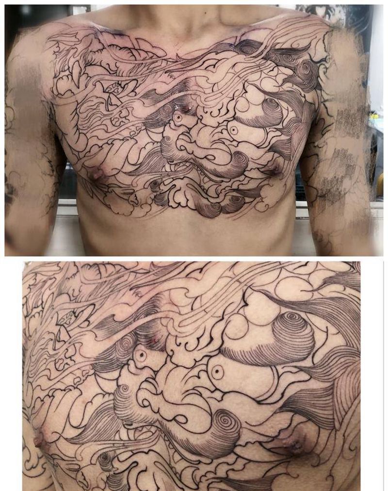 花胸未完纹身图片_胸部纹身图案