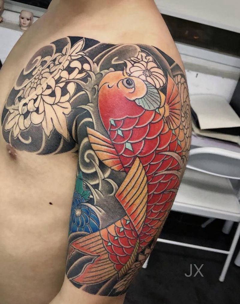 半甲鱼未完纹身图片_手臂胸部老传统纹身图案