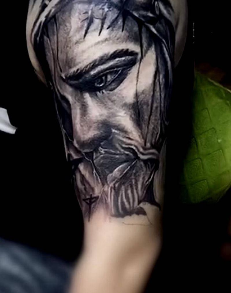 耶稣纹身图片_手臂纹身图案