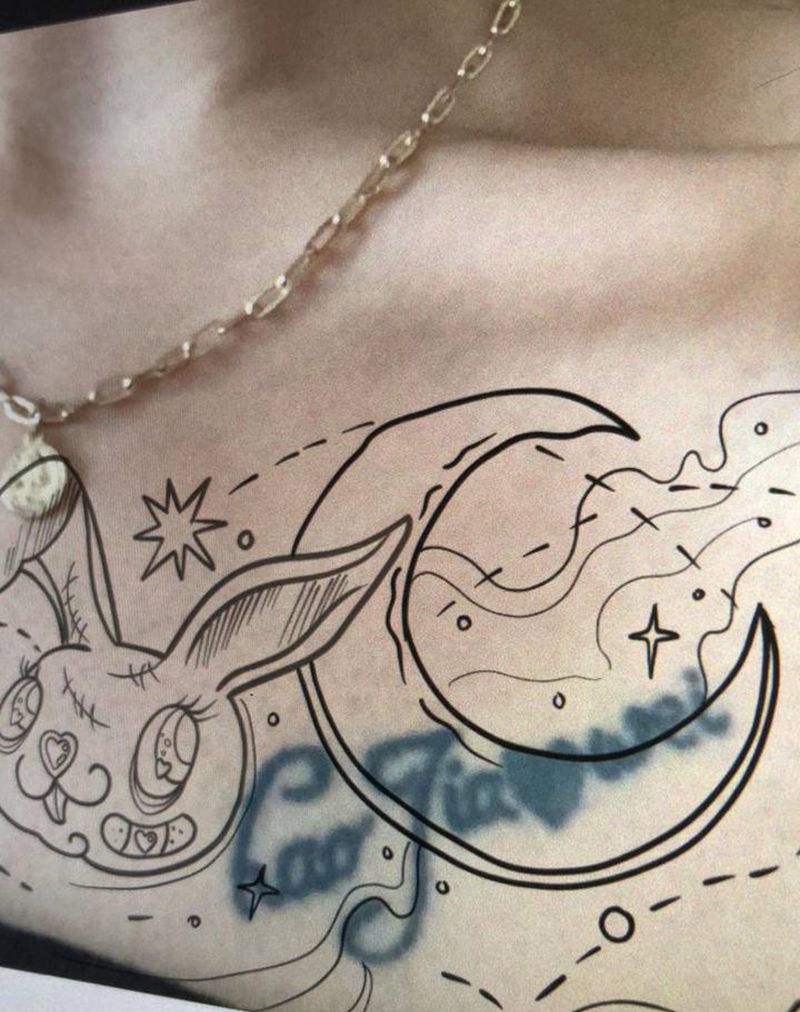 遮盖纹身图片_胸部纹身图案