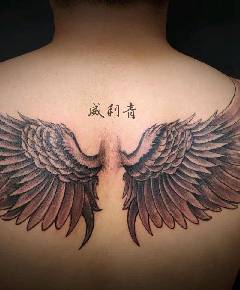 后背翅膀纹身图片_背部欧美写实翅膀纹身图案