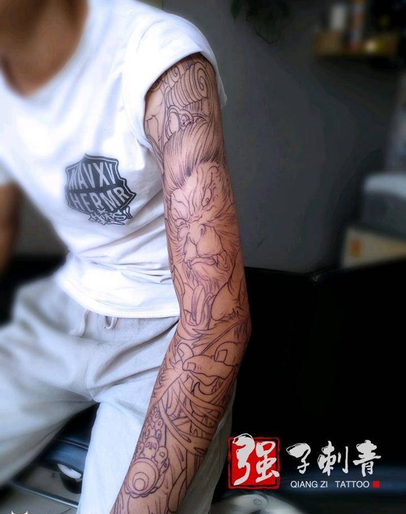 齐天大圣花臂割线纹身图片_手臂新传统齐天大圣纹身图案