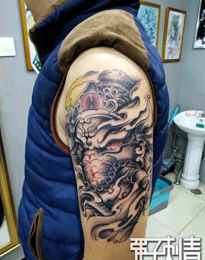 经典款象神纹身图片_手臂新传统纹身图案